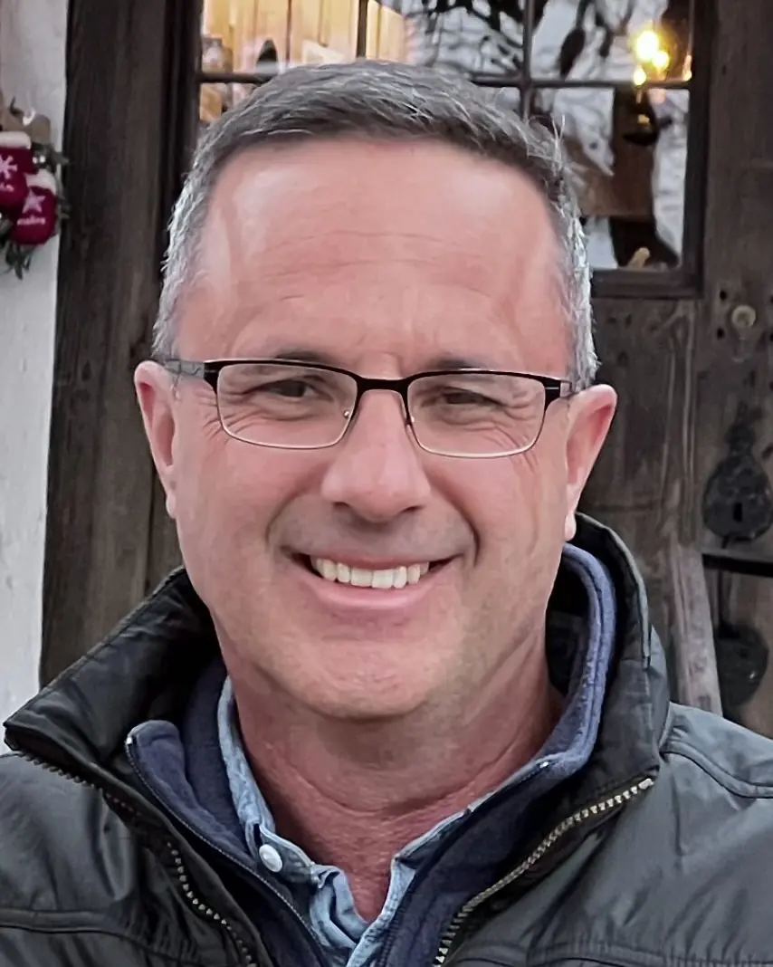 Zac Northup, smiling, in a color close-up portrait.